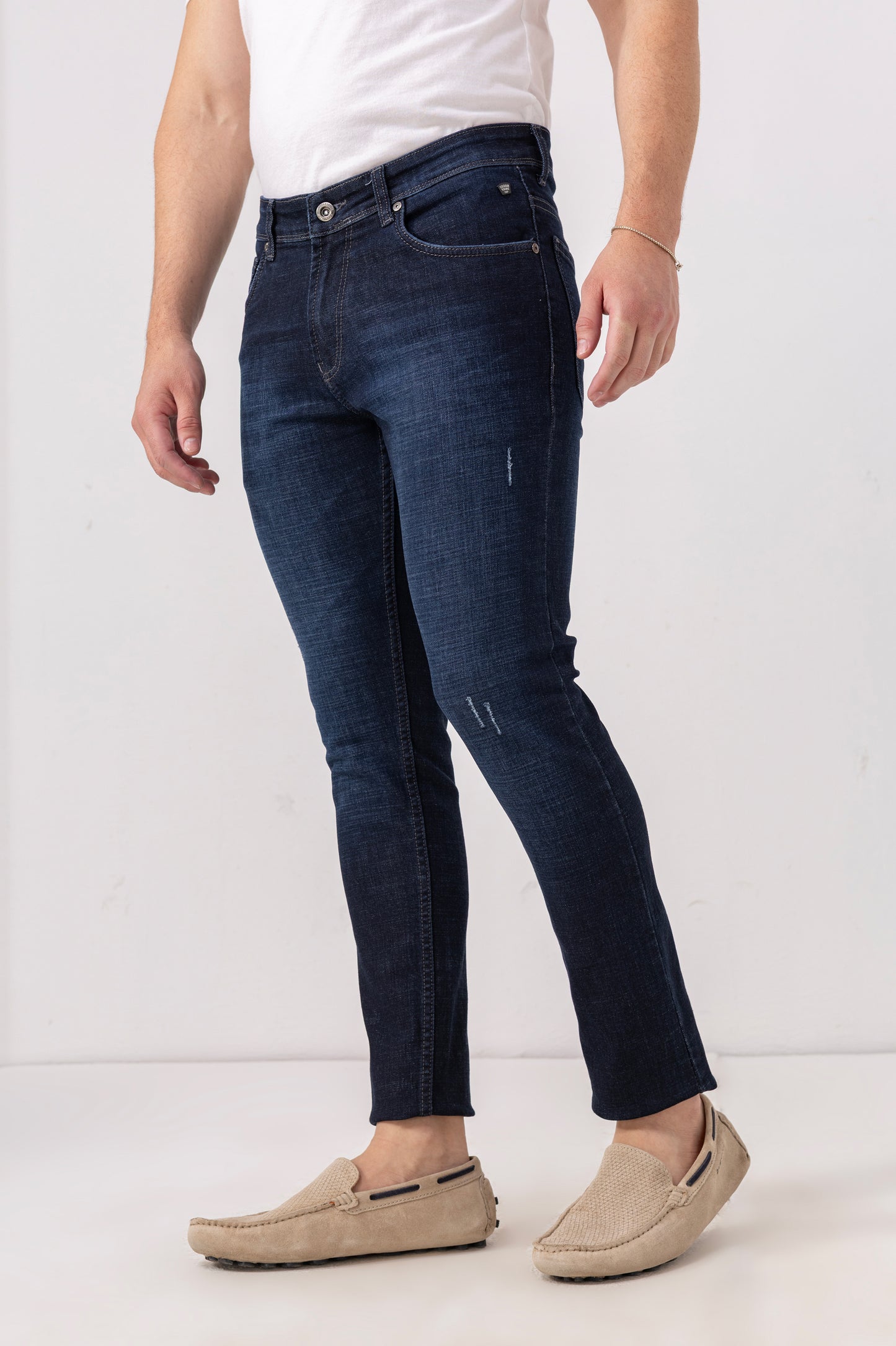 Indigo Fade Slim Fit Denim Jeans with Light Distressing