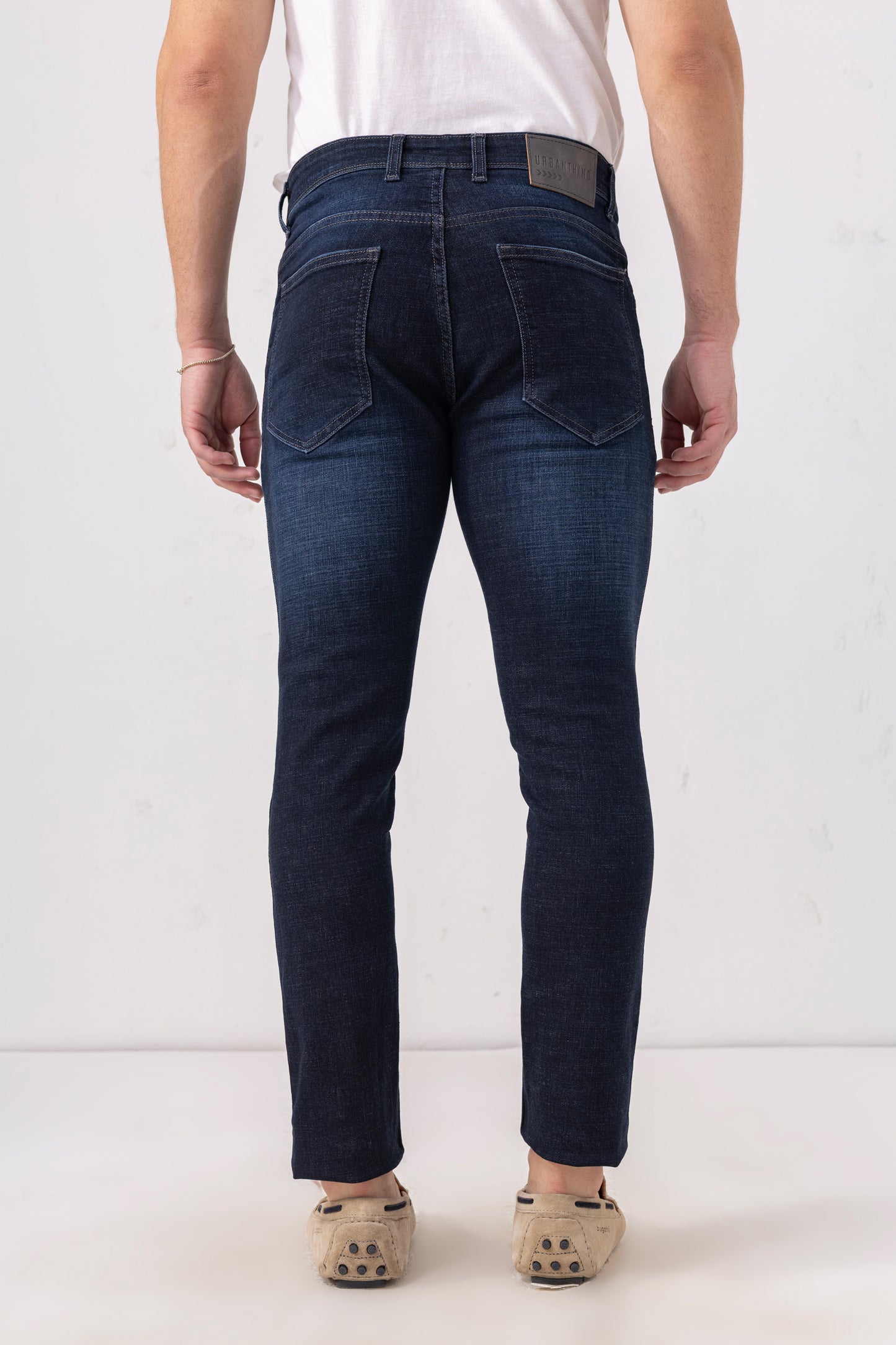 Indigo Fade Slim Fit Denim Jeans with Light Distressing