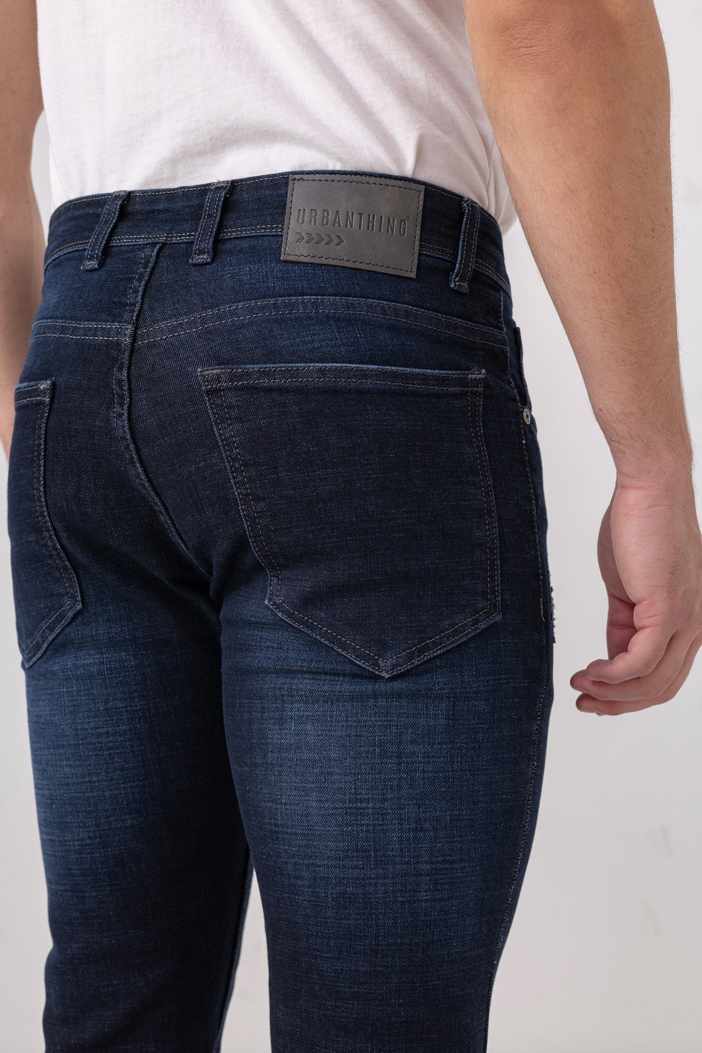 Indigo Fade Slim Fit Denim Jeans with Light Distressing