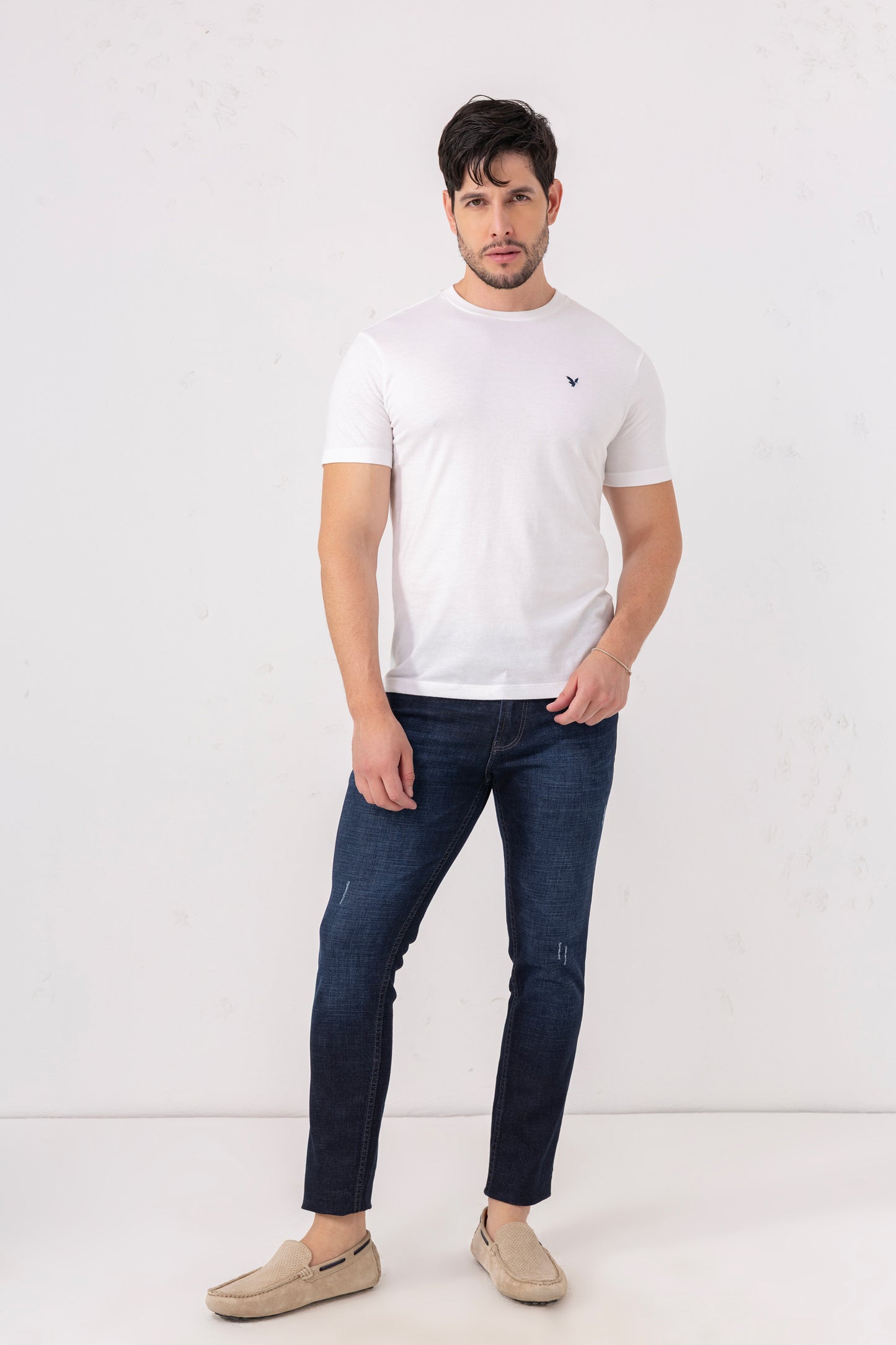 Indigo Fade Slim Fit Denim Jeans with Light Distressing